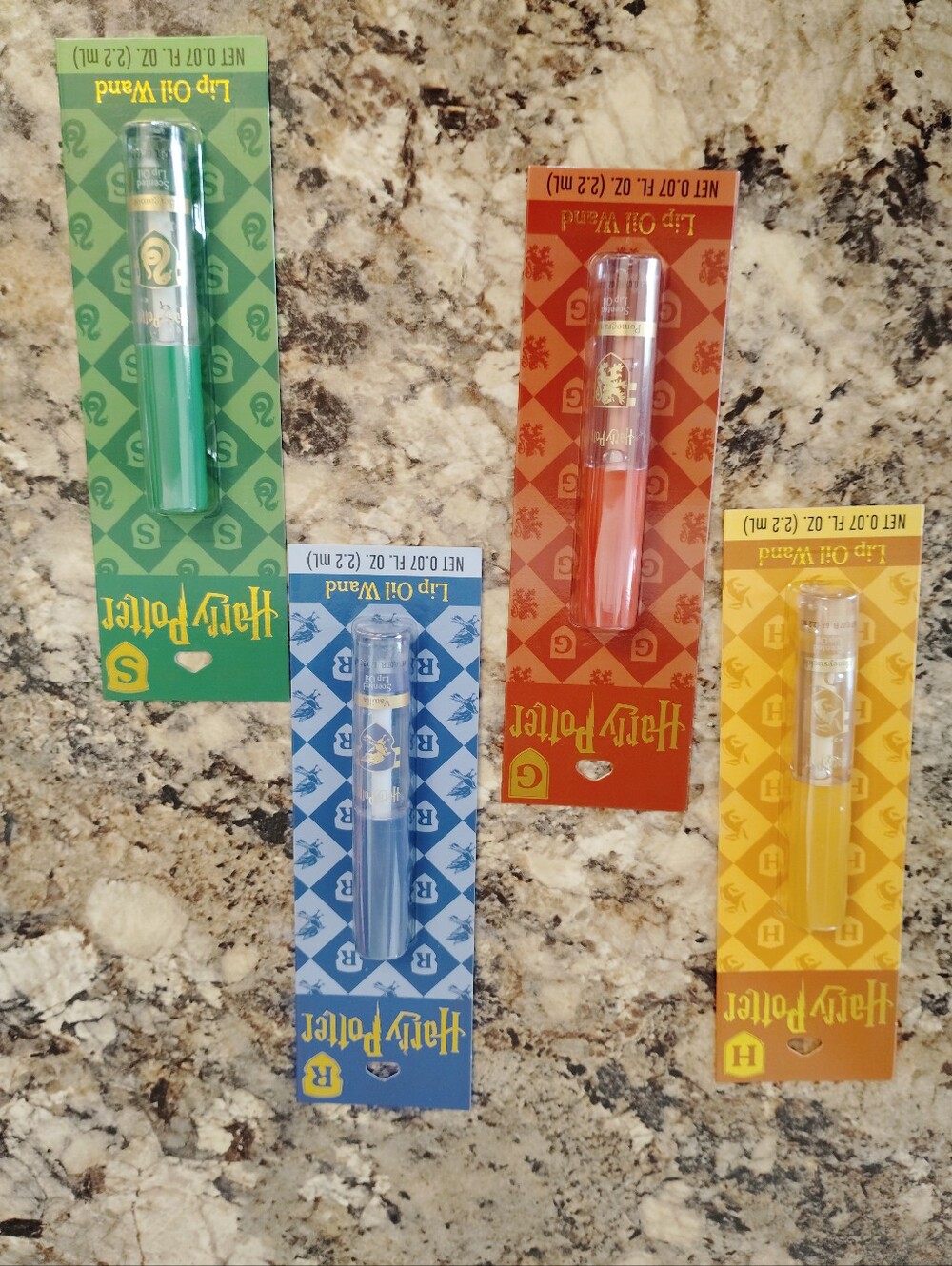 💚💙❤️💛 Collectors nostalgic Harry Potter Lip Oil – 4 Colors Available! ✨